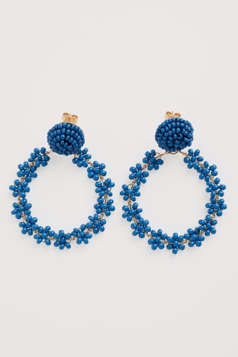 Redpoll Beaded Circle Earrings Model Image