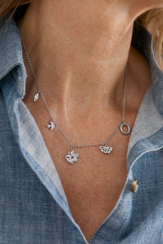 Flora Silver Tone Charm Necklace Model Image