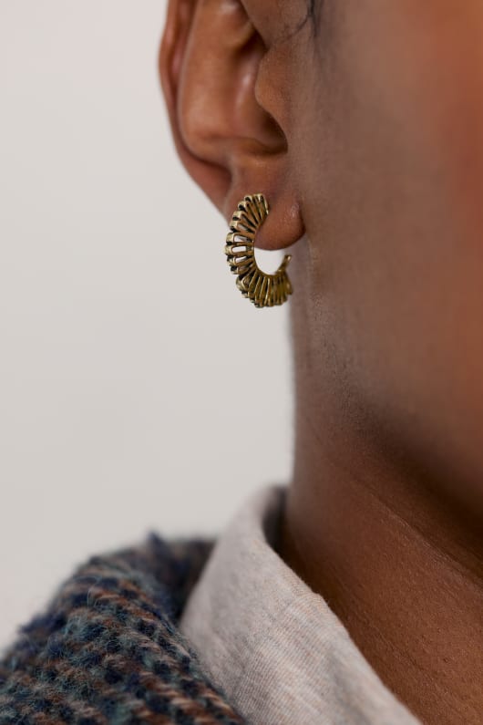Strawflower Gold Tone Floral Hoop Earrings Model Image