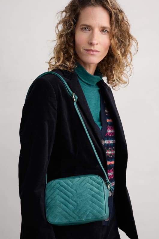 Annulet Quilted Leather & Suede Crossbody Bag Model Image
